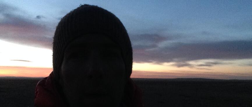 My beanie covered head cuts a sillouhete in the pre-sunrise.