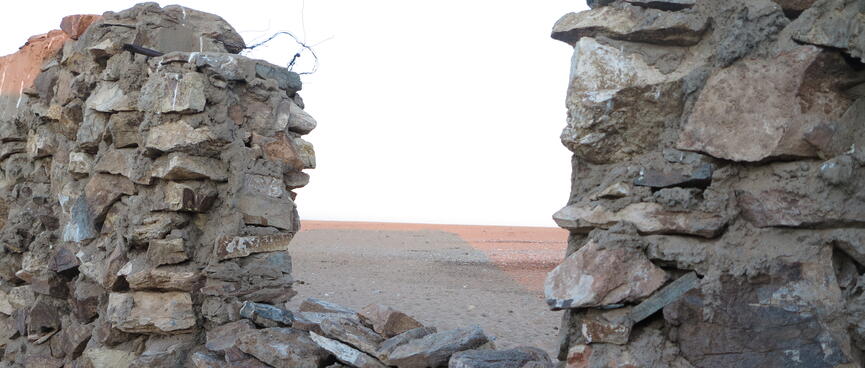 Cemented layers of rocks form the buildingʼs walls.