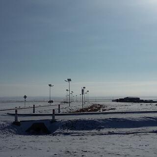 At the edge of town, houses and roads disappear and there is only a great expanse which looks like an ocean.