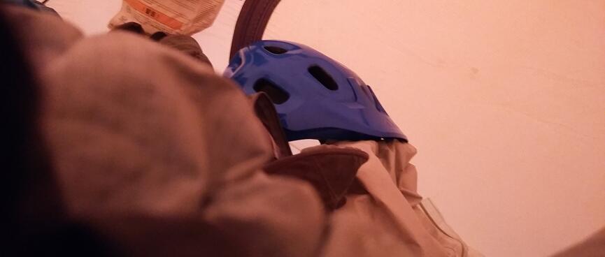 Tent walls and a pile of gear form the view from my sleeping bag.