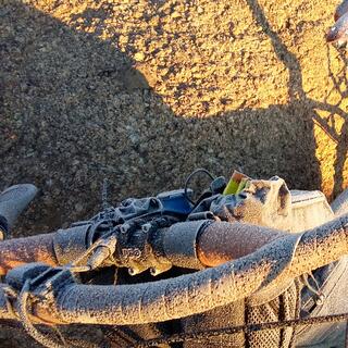 A thick coating of frost on my bikeʼs loop handlebars.