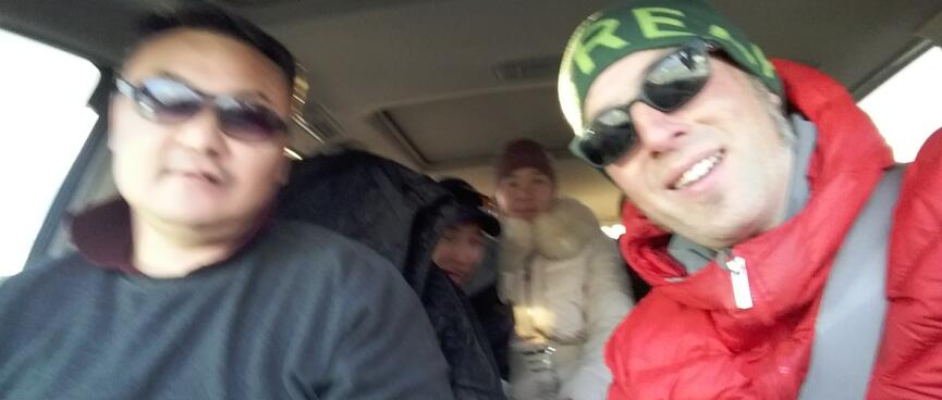 Selfie with myself, driver and two younger people in the back seat.