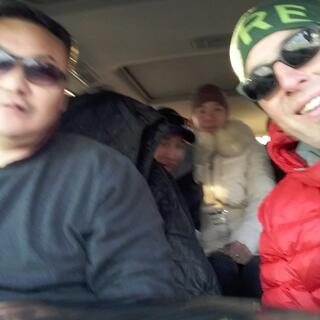 Selfie with myself, driver and two younger people in the back seat.