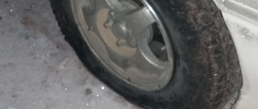 A front wheel has a flat tyre.