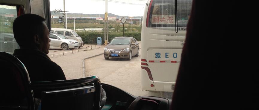 Our tour bus driver negotiates traffic.