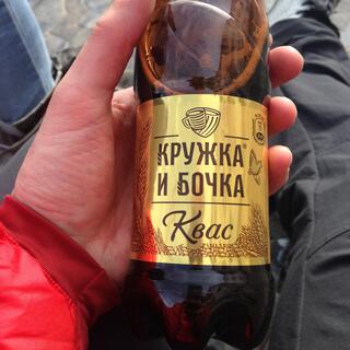 A bottle of Kbac wears a golden label and contains a mysterious brown liquid,