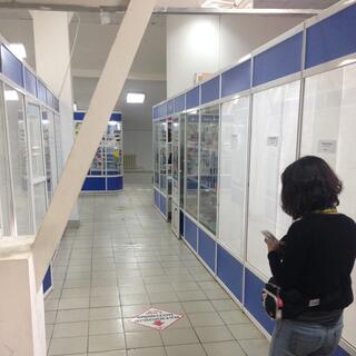 Wanna walks down a tiled hall, in Chita.