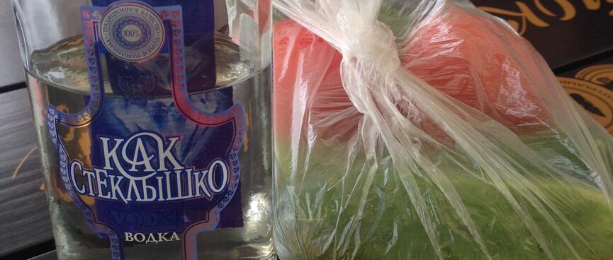 Half a bottle of vodka and a bag of tomatoes and cucumbers.