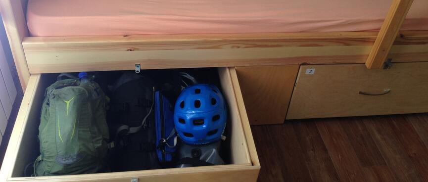 My panniers easily fit into the locker under my bunk.