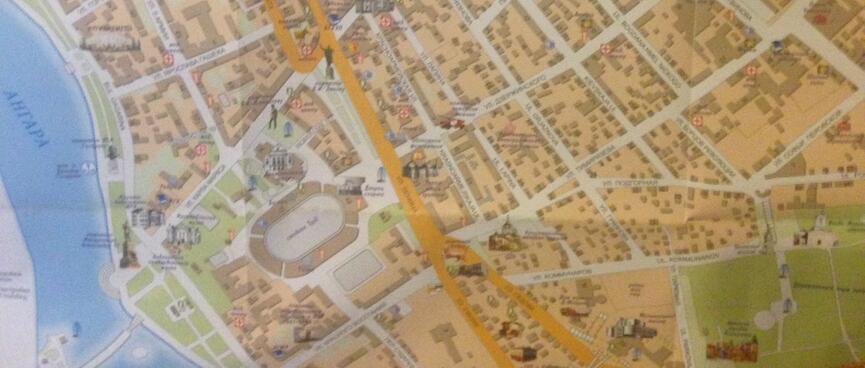 A neighbourhood grid is disrupted by long angled streets.