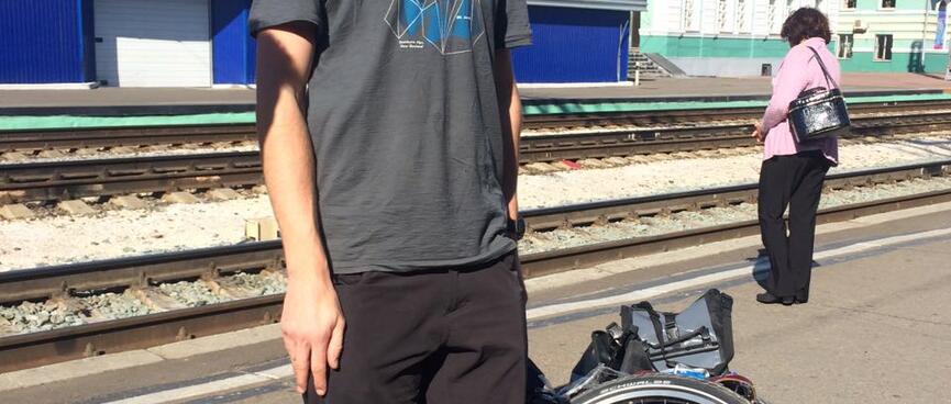 I pose with my disassembled bike.