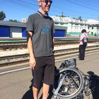 I pose with my disassembled bike.