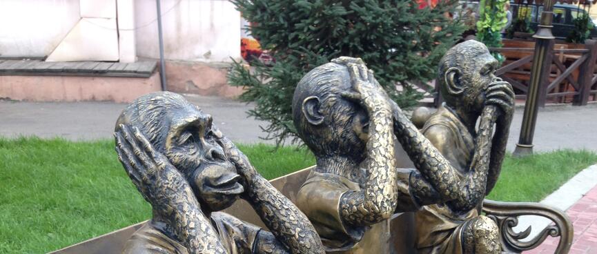Three bronze monkeys act cover their ears, eyes and mouth, in Irkutsk.