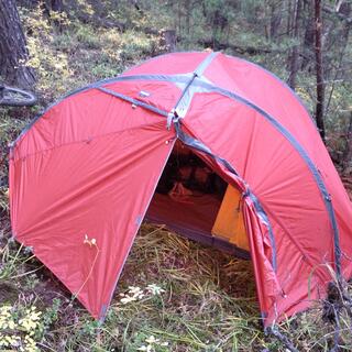 My tent pitched on an angle amongst the trees.