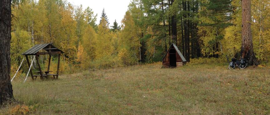 A squat shelter without walls.