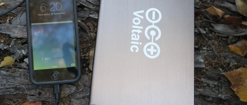 My iPhone charges from my Voltaic V72 cache battery.