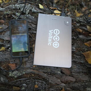 My iPhone charges from my Voltaic V72 cache battery.
