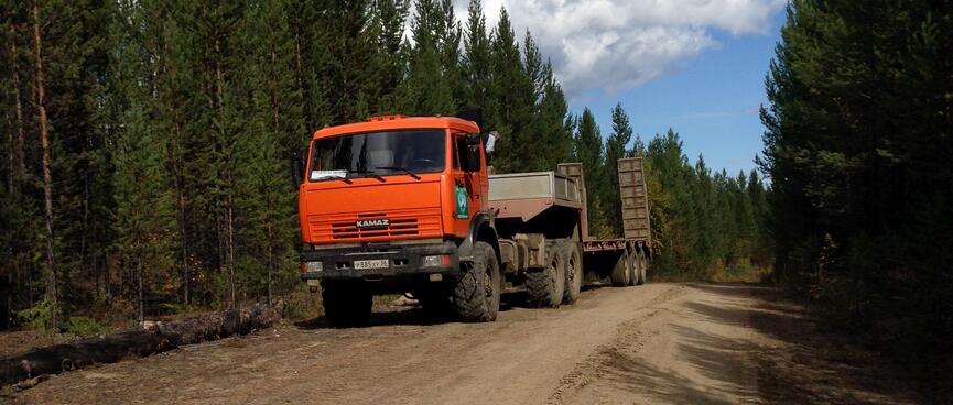 A large truck is parked on the side of the road.