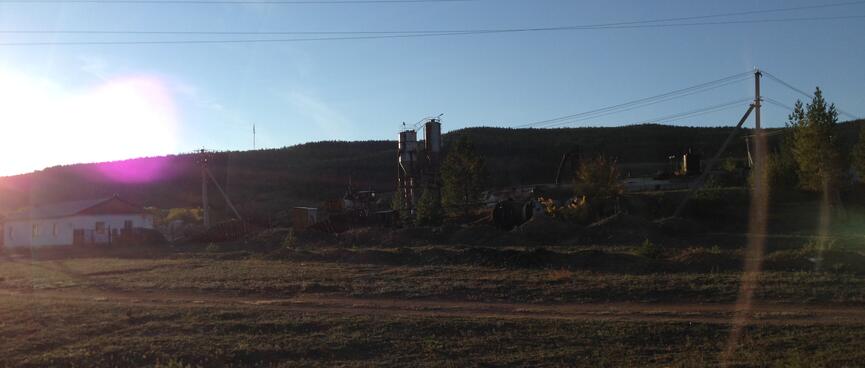 The metal silos of a small factory.