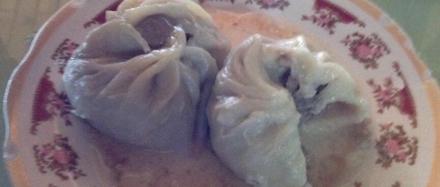 Large dumplings in a thin soup.