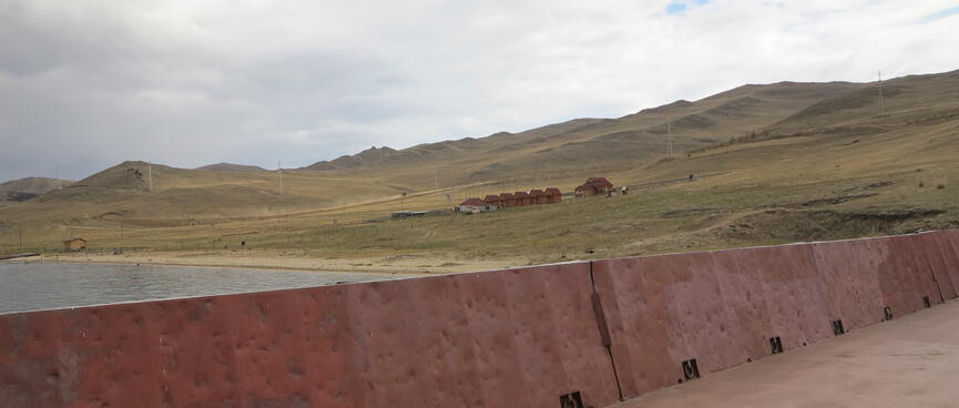 Nearby houses on the hillside.