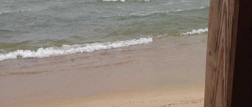 The sandbar from a raised wooden platform.