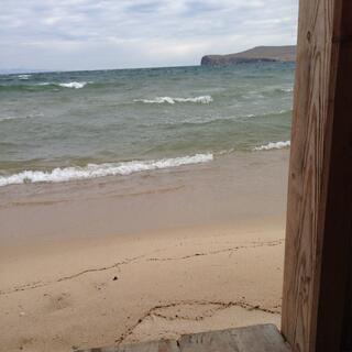 The sandbar from a raised wooden platform.