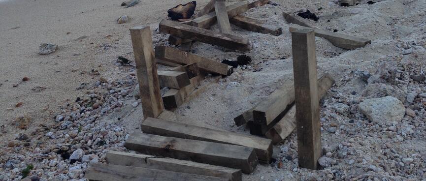 Two wooden posts and a couple of planks.