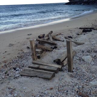 Two wooden posts and a couple of planks.