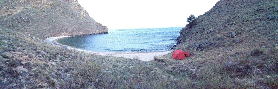 My orange tent is nestled into the right side of the bay.