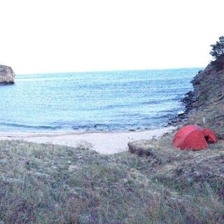 My orange tent is nestled into the right side of the bay.