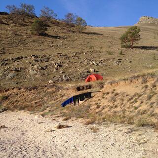 My riding gear hangs over a metal outfall pipe.