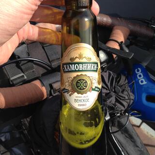 A tall green beer bottle and the Trollʼs cockpit.