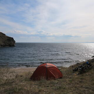 Looking over the tent to the sea beyond.