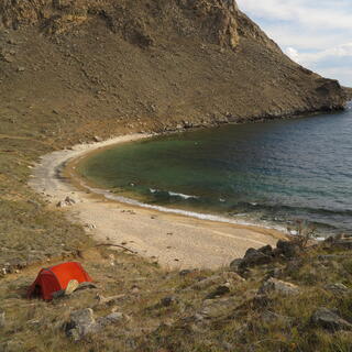 My little orange tent on the edge of the bay.