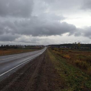 The road climbs to a small town.