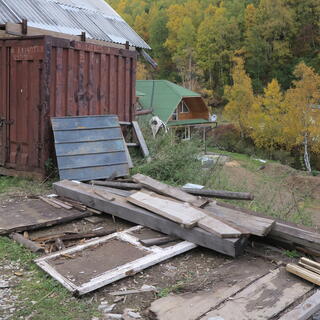 A messy pile of timber and iron.
