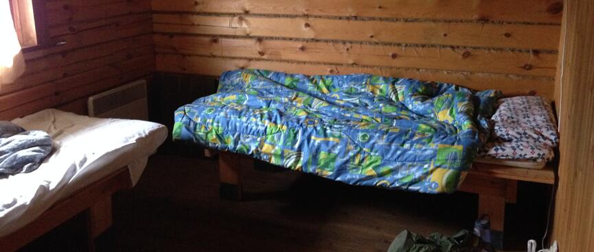 Two simple wooden beds.
