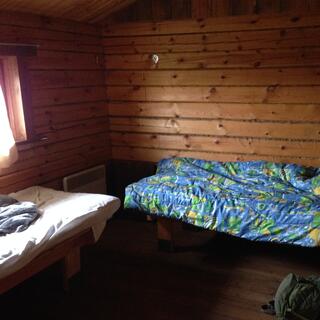 Two simple wooden beds.