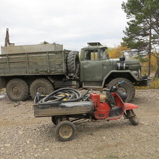Army style truck and motorbike.