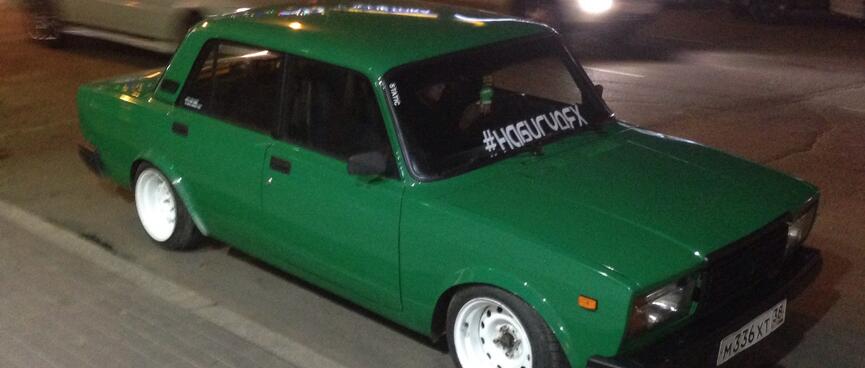 The pimped Lada, with white mags and low profile tyres.