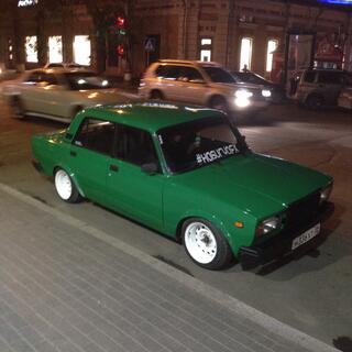 The pimped Lada, with white mags and low profile tyres.