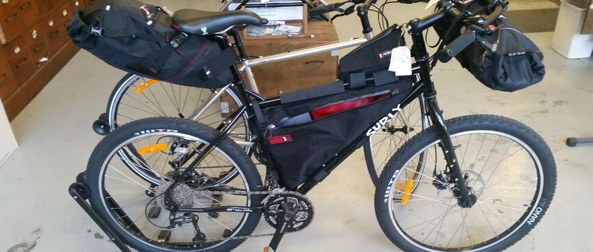 Surly Troll fitted with handlebar, frame and seat packs.