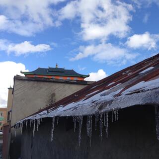 Stalactites hang from a tin roof.