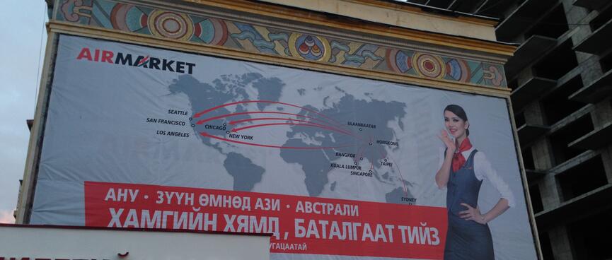 A huge billboard shows flight connections between Ulaanbaatar, America and Australasia.