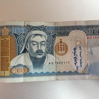 The face of Genghis Khaan, on the front of a 1000 Tugrik bill.