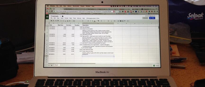 A spreadsheet of timesheet entries on the screen of my MacBook Air.