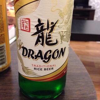 A bottle of Dragon Traditional Rice Beer.