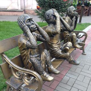 Three bronze monkeys act cover their ears, eyes and mouth, in Irkutsk.
