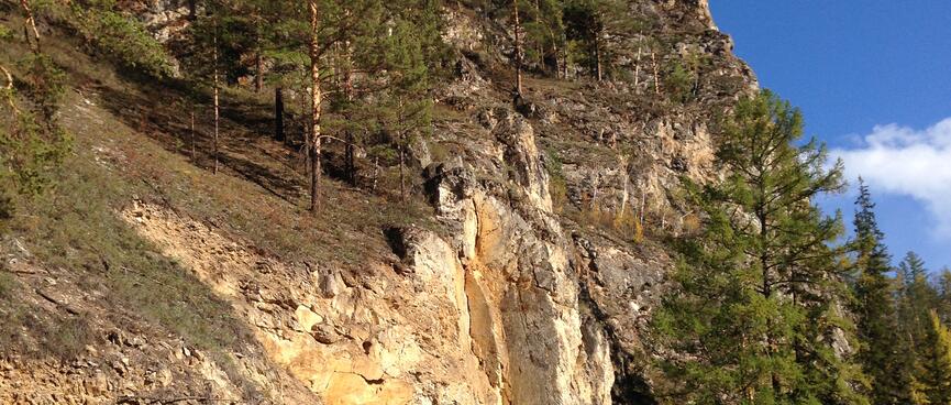A rocky hill erodes in a landslide.